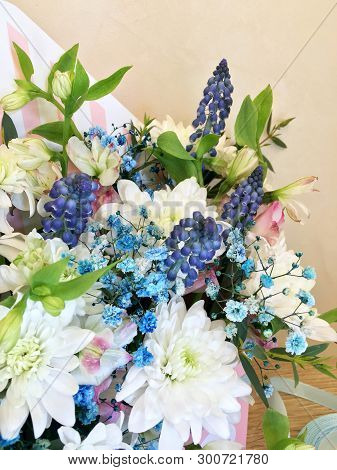 Composition With Colorful Flowers. Flowers Blue Muskari, White Chrysanthemum, Alstroemeria And Blue 