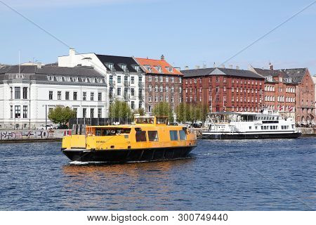 Copenhagen, Denmark - April 15, 2019: Yellow Public Transportation Boat Bus In Copenhagen, Denmark