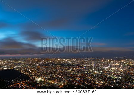 Night Cityscape View Of Sapporo City From Mountain Moiwa Observation. The Most Popular Tourist Desti