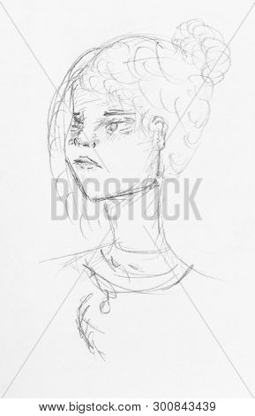 Girl's Head With Displeased Face And Bun Hairstyle