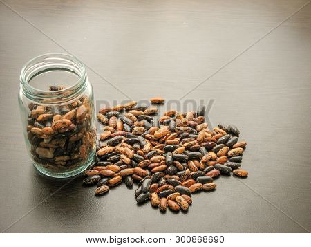 Short Leg Bean Seeds (phaseolus Vulgaris) In A Glass Jar On The Wooden Table. Short Leg Bean Seeds I