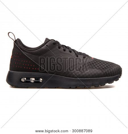 Vienna, Austria - August 30, 2017: Nike Air Max Tavas Black Sneaker On White Background.