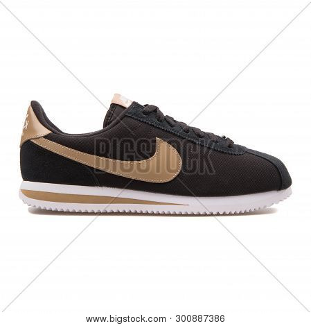 Vienna, Austria - August 30, 2017: Nike Cortez Basic Premium Qs Black And Beige Sneaker On White Bac