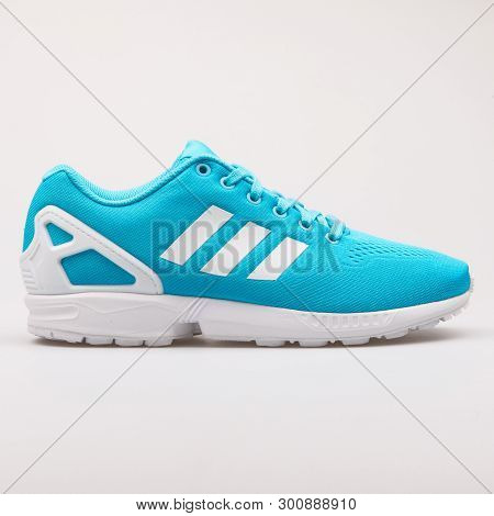 Vienna, Austria - August 30, 2017: Adidas Zx Flux Em Cyan Sneaker On White Background.