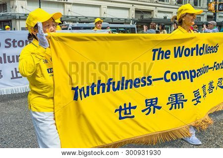 May 12, 2019 - Vancouver, Canada: Falun Dafa Members In Parade Through Streets Of Downtown On Mother