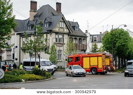 Strasbourg, France - Apr 28, 2019: Police Officers And Firefighter Truck Securing Entrance To Rue Sc