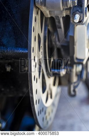 Macro Shoot Of Motorcycle Rear Wheel Brake Disk.