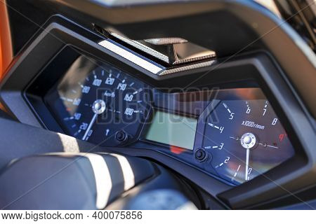 Closeup Shoot Of Modern Motorcycle Dashboard Panel With Speed Gauges.