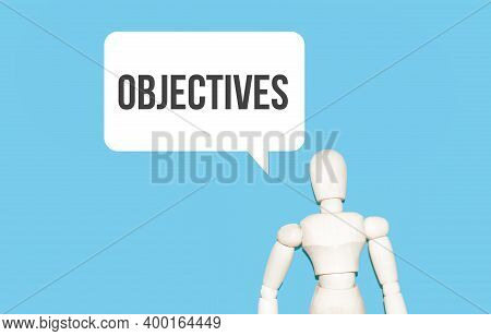 The Wooden Man And White Cloud With Text Objectives. The Content Of The Lettering Has Implications F