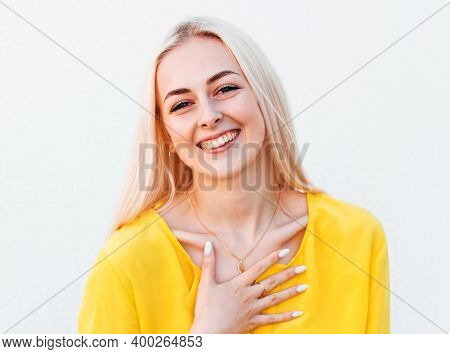 Portrait Of Young Cheerful Smiling Woman, Over White Background