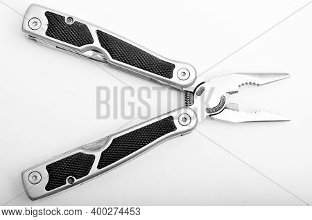Stanless Steel Folded Multi Tool Isolated On White Background