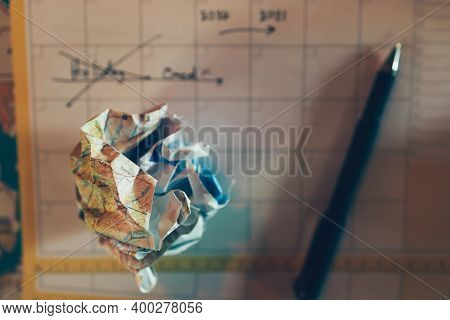 Crump Paper Map On Calendar. Cancel And Fail Plan Travel, Holiday, Vocation And New Year Concept.