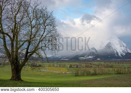 Winter Landscape With Snow Covered Grimming Mountain In Ennstal, Steiermark, Austria