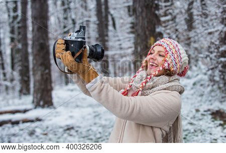 Inspiration Create Something Special. Spend Day Outdoors. Girl With Vintage Camera In Snowy Nature. 