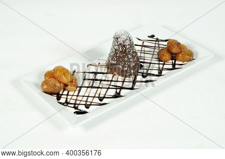 Prepared For Special Occasions, Delicious And Beautiful Chocolate And Chestnut Small Cake, Isolated 