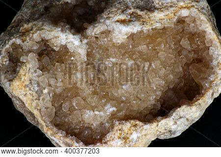 Crystalline Calcite Geode (caco3) In Limestone On Black Background
