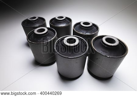 Close-up Wide Angle. A Group Of Cylindrical Silent Blocks For The Rear Suspension Of An Off-road Veh