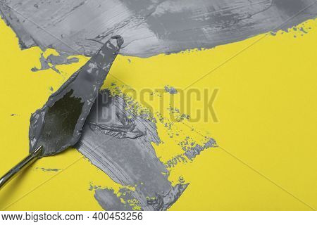 Colors Of The Year 2021 Ultimate Gray And Illuminating Background.  Ultimate Gray Paint On Yellow Il