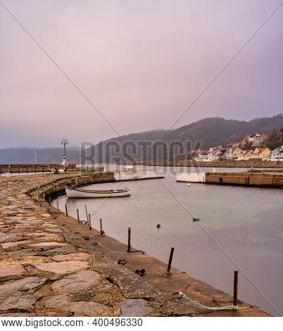 An Empty Marina In The Winter. Mountains In Fog In The Background. Picture From Molle, Scania County