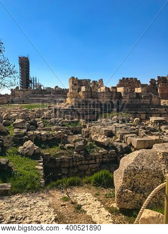 Roman Ruines Of Ancient Heliopolis In Baalbek. Blue Sky. Copy Space