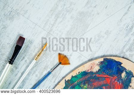 Brush Writes The Acrylic With Oil Paint On Dask