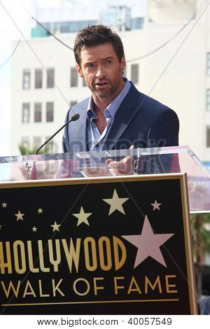 LOS ANGELES - DEC 13: Hugh Jackman på Hollywood Walk of Fame-ceremonien for Hugh Jackman på Holly