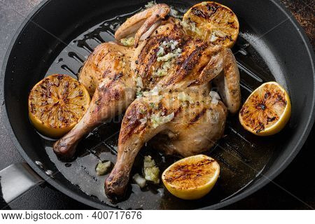 Grilled Fried Roast Chicken Tabaka, On Old Rustic Background