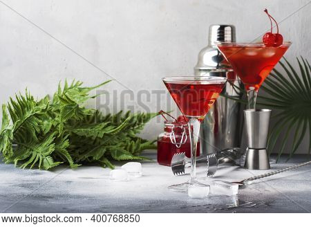 Cosmopolitan Cocktail With Vodka, Liqueur, Cranberry Juice, Lime, Ice And Orange Zest, Gray Bar Coun