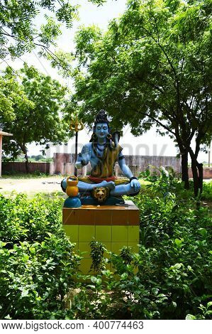 Statue Of Lord Shiva And Background Raining