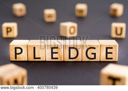 Pledge - Word From Wooden Blocks With Letters, Deposit, Guarantee, Bail, Promise, Pledge Concept, Ra