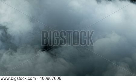 Photo Of Realistic Clouds, Smoke, Dry Ice Smoke Texture On Black Dark Background. For Website Backgr