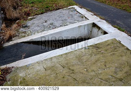 Concrete Bridge Intended For The Outflow Of Treated Water From The Wastewater Treatment Plant Direct