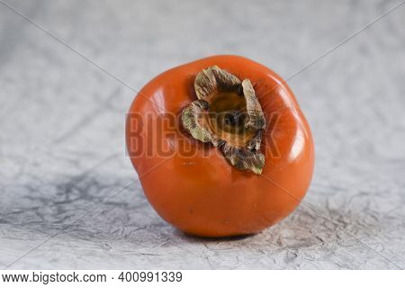 Close Up Of Persimmon Isolated On White Background. Clipping Path. Full Depth Of Field