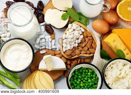 Healthy Diary And Non-diary Products Rich In Calcium On Grey Background