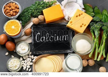 Healthy Diary And Non-diary Products Rich In Calcium On Dark Background