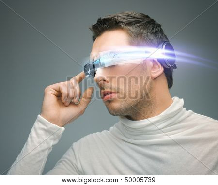 future technology and science fiction concept - man with digital glasses
