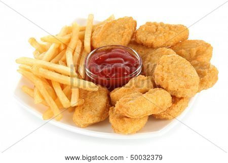 Fried chicken nuggets with french fries and sauce isolated on white