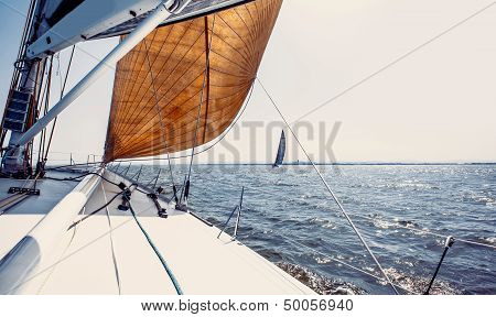 Sailing ship yachts with white sails