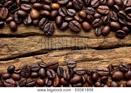 Coffee Beans On Wood Background