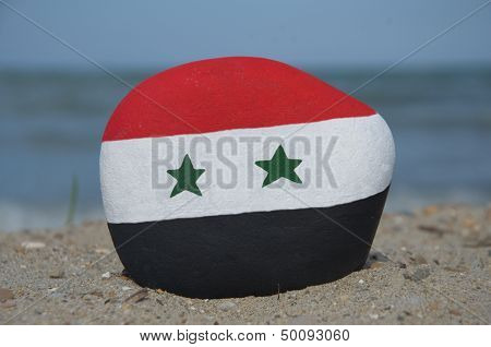 Flag of Syria on a stone