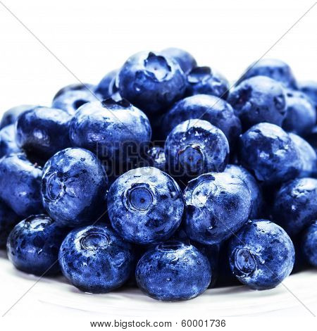 Blueberries On White Plate Isolated On White Background With Copy Space For Text, Close Up. Group Of