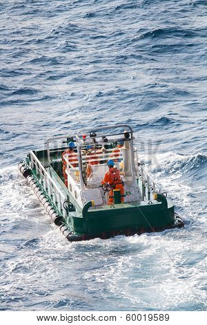 boatman working on deck supply boat, crews operation on installation boat, heavy job in offshore