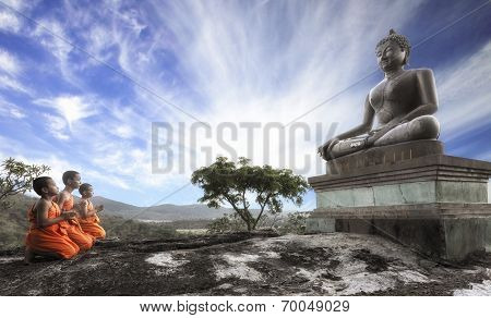 Lord Buddha Day or Vesak Day Buddhist monk praying to the Buddha