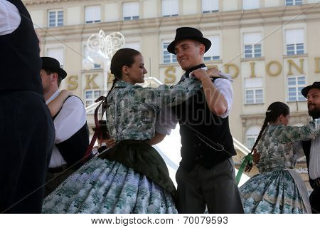 ZAGREB, CROATIA - JULY 19: Members of folk groups Nograd  from Salgotarjan, Hungary during the 48th International Folklore Festival in center of Zagreb, Croatia on July 19, 2014