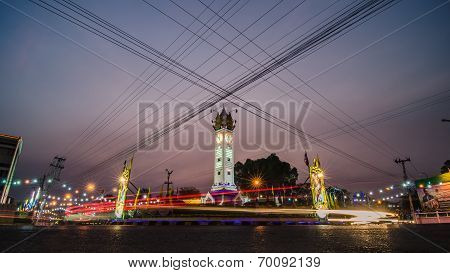 Clock tower evening with traffic lights trails