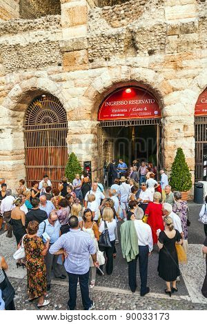 Visitors Wait Outside The Arena Di Verona For Entrance