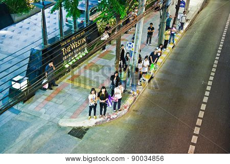 People Wait For The Next Bus At Sukhumvit Road