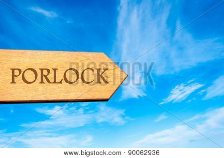 Wooden arrow sign pointing touristic destination