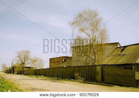 The street along deserted destroyed church behind
