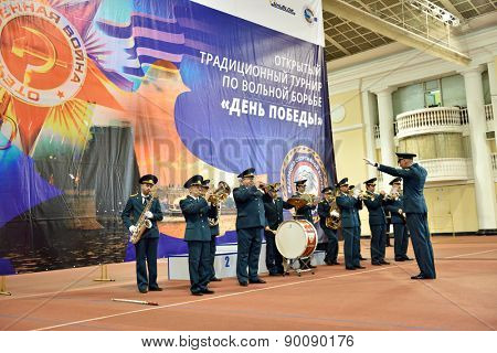 ST. PETERSBURG, RUSSIA - MAY 6, 2015: Military orchestra plays on the opening ceremony of International freestyle wrestling tournament Victory Day in Mikhailovsky manege